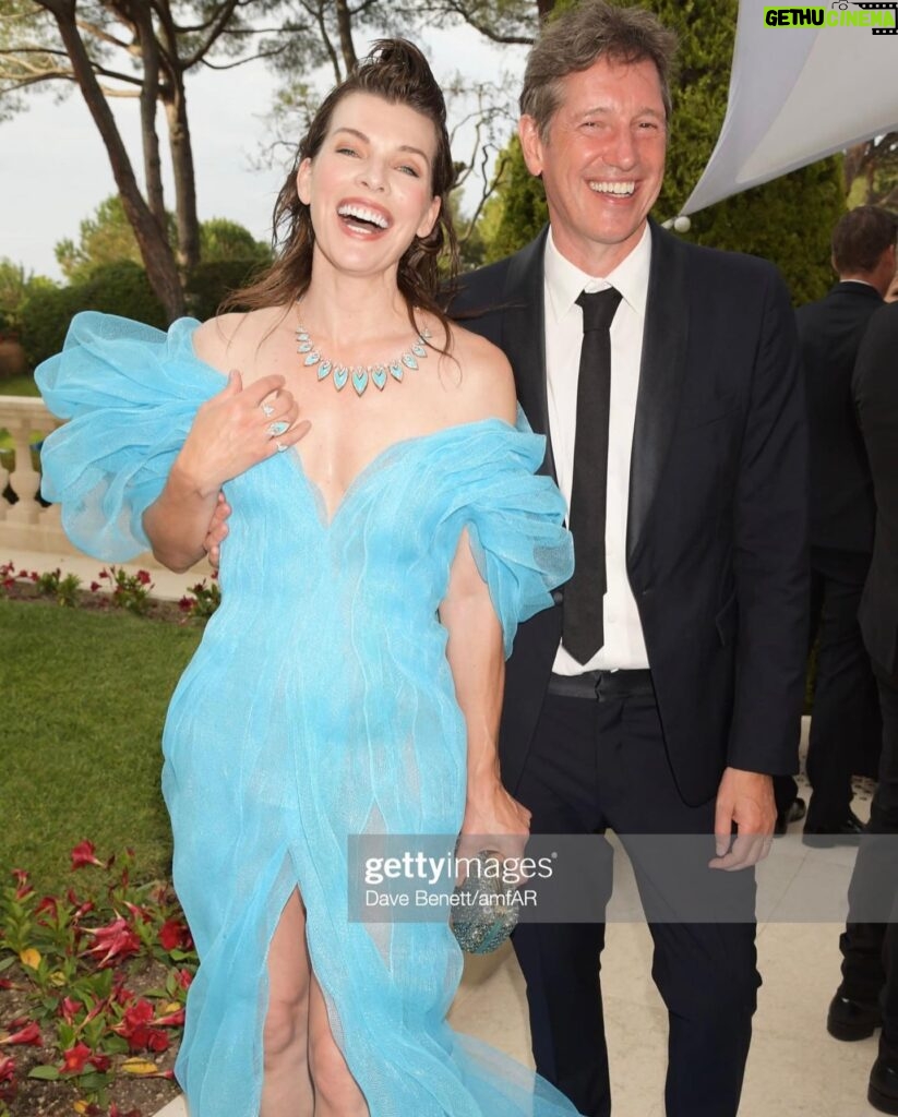 Milla Jovovich Instagram - Thank you @amfar for being a ray of light in this dark world right now. I am so proud to support all the incredible break throughs in medicine that this organization has made possible over the years through their fund raising for people living with HIV/AIDS as well as raising awareness for the prevention of the disease. I was lucky enough to be dressed for the gala by my fellow Ukrainian, the incredible designer @lever_couture! Together, my daughter @everanderson and I completed the Ukrainian flag with our colors on the red carpet! A special thank you to @messikajewelry and my amazing glam team: make up @patidubroff and hair @cyrillaloue!