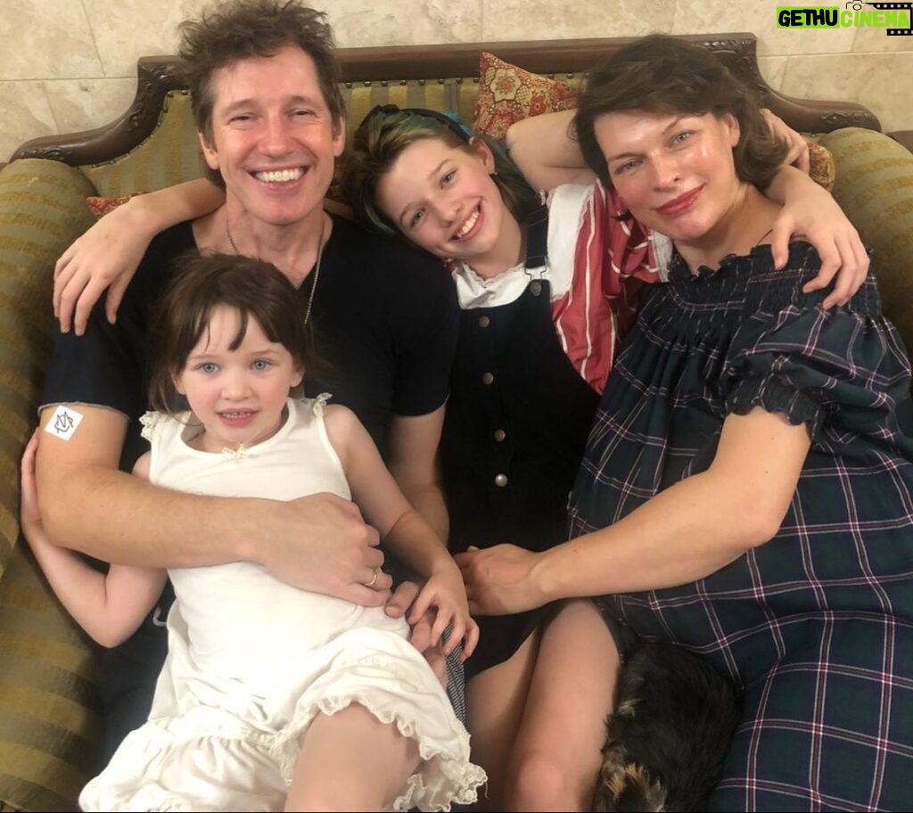 Milla Jovovich Instagram - Happy Father’s Day to our most incredible Papa!! Here’s a little recap of your journey to being the best daddy in the world! It feels like you were really meant to be a dad. You always took such great care of me, the “big baby”😂 and you naturally added Thing 1, 2 and 3 into the mix over the last 15 years. Everyday I am amazed and in awe of how gentle, kind and attentive you are to each and every one of us. The hours you’ve spent making thousands of bottles of milk for the babies, the same amount of cups of tea for me, doing math homework, building legos, playing dolls, Uno, Dungeons and Dragons, building cars, buses and rocket ships out of card board boxes, getting your nails done in rainbow colors, getting your hair and make up done, getting vomited on (and worse) god knows how many times and all with a great big smile though it all. You make it look easy when I know it’s anything but. You are our EVERYTHING. We would be lost without your love, time and energy because it seems boundless and the well never seems to run dry. You truly are the most amazing daddy. To all your babies. Big and small. I love you Papa.❤️❤️❤️ You’re the ultimate KING👑!!! #paulwsanderson #fathersday #iloveyou
