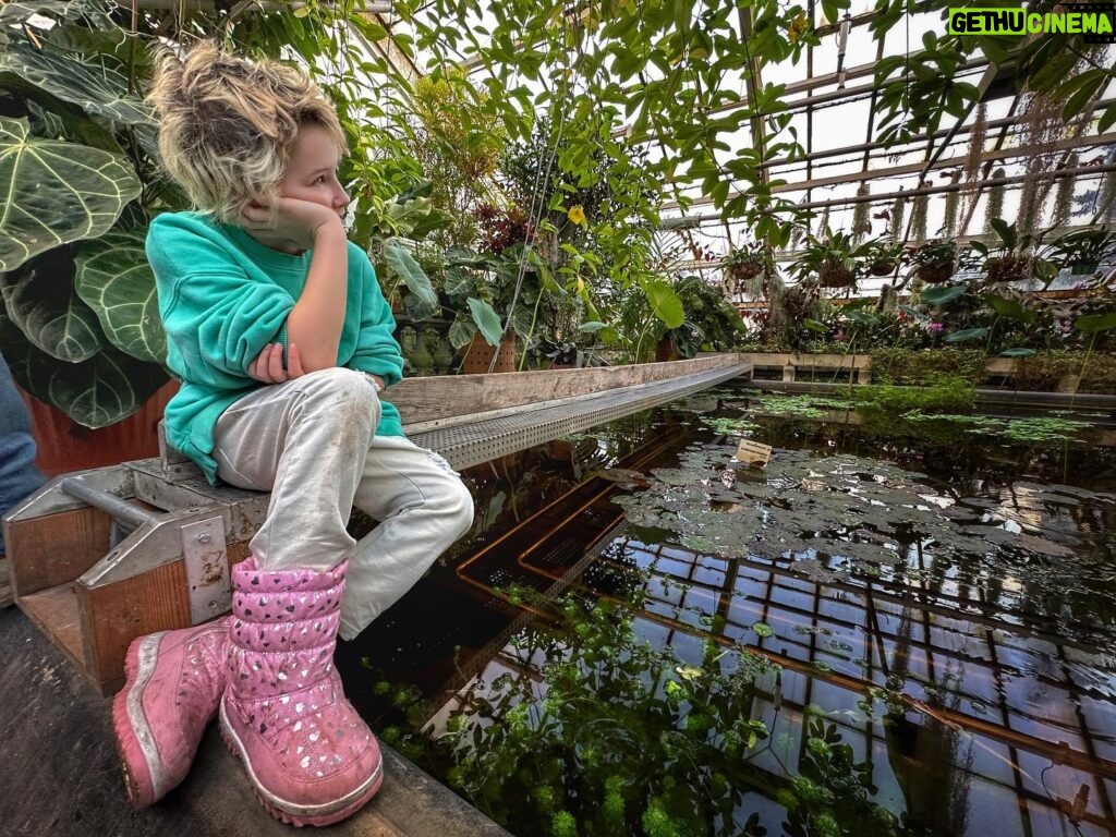 Milla Jovovich Instagram - Never thought a trip to the botanical gardens would make the kids so peaceful and introspective. We all wandered through the humid environment and the little ones would sit so still waiting for the fairies to come out of hiding. The girls watched the reflections of the plants and leaves in the pools of water, speaking in whispers. I took the opportunity to snap some beautiful, poignant pictures that I knew captured the mood we all felt. Some places have magic. You can feel them. Kids feel them even stronger and react in unexpected ways. My own who are usually chatterboxes just perched in out of the way places and let the garden speak to them in its warm, languorous, embracing way. And it all felt exactly as it should. And it all felt just right.  Xo m❤️