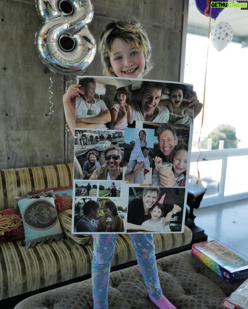 Milla Jovovich Instagram - Happy 8th birthday to my sweet, kind, thoughtful and most loving little girl Dash! She’s really the rock of our family. Such an amazing big sister to the baby, such a wonderful little sister as well. Here are some pics with the cards that we made for her! I collaged a “Magical Treehouse” card and her dad made a collage of the two of them over the years. Her older sister made the most beautiful and creative pop up card that’s so cool! Also thank you to @ballooncelebrations for the epic balloon fantasy land she woke up to this morning!