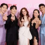 Anna Cathcart Instagram - these tiny finger hearts could never express the amount of  love i have for these people🤍 truly how did i get so lucky!! to noah, your support means more than you know🫶 and to my xo fam, i love you and i couldn’t be more proud of us🥹❤️