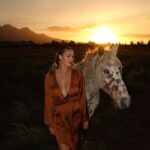 Kinsey Wolanski Instagram - Find that thing that motivates you to work hard. For me, it’s always been travel. Travel fills my soul and now my goals align with having the flexibility in my career to be able to experience new parts of the world 🌎 
@ludusmagnus_franschhoek 

#travel #southafrica #winefarms