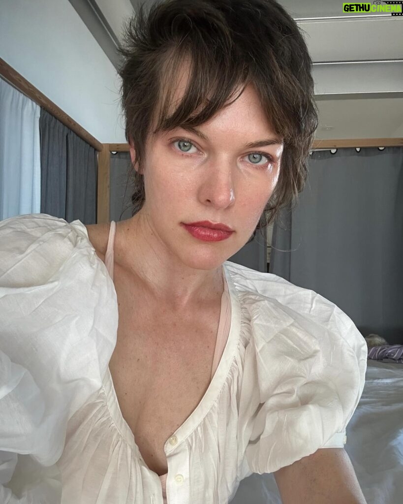 Milla Jovovich Instagram - Good morning! I’ve had a chance to spend some time on my own to catch up on work and just have some me time! Summer is no joke with kids out of school and it’s been busy in the Jovovich-Anderson household with 3 kids and 3 dogs! Apart from catching up on some great tv shows, I’ve been adapting a book into a screenplay (it’s not sci fi either hehe), which has been a very interesting experience. I’ve always loved writing and this has actually made me love and understand this book so much more because suddenly the characters have taken a life of their own in my imagination. Different from just reading it because I’m actually able to allow them to speak their thoughts out loud, if that makes sense. I’ve also been doing some more artwork on my walls. Some of you commented on the art behind me in my last post and I decided to mess around with it some more because I wasn’t happy with it when I drew it and kind of left it for a while. (Swipe to the end to see what it’s turned into.) I think it’s pretty cool so far, but my wall art is always developing and changing which is a lot of fun. Every morning I exercise my dogs, but especially my huge, dragon dog Welly. I call him my personal dragon because he’s enormous, super protective and when he jumps to catch the ball, he looks like he should sprout wings. I also got some rad pictures of some beautiful flowers that just came up in our backyard. I’m not sure what species they are, but they’re drought resistant because they’ve managed to survive here as innocuous bushes even without water for ages before the rain came and then suddenly flowered into these brightly colored beauties. I got a picture of a bee on one of them (towards the end of the series) and on another I zoomed in and realized that a fly landed on the same flower as the bee! Kind of strange but I think it’s a great moment. Anyway, enjoy my photo dump of the last 12 hours! Have a great day everyone!💥