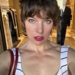 Milla Jovovich Instagram – I’m so excited to have been invited to attend the @amfar event and help raise money for this cherished cause in Venice, Italy! It’s been a healthy decade I haven’t been to Venice and it’s such a dream coming back here. Riding from the airport in a water taxi, watching the delicate, medieval city, opening up before me in such a calming and soothing way after a long and sleepless flight. The feel of the boat rocking underneath me is already getting me prepared for delights to come. We float on the water and get dropped at our hotel, which is a thousand year old monastery that was actually abandoned for over one hundred years before it got renovated into a hotel.  A bit on the spooky side, but I’m totally in to see some ghosts, hands down!  The light is so gorgeous everywhere that even with no sleep on the flight (I started playing Baldur’s Gate 3🤯 and I wasn’t about to have something as pesky as sleep stop me from jumping down that rabbit hole😂 ) I just put on minimal make up, tinted sunscreen, mascara, spf lipstick, I feel red carpet ready! This light ignores signs of jet lag and literally gives you a wink and secretly hands you 5 years back without even asking for a thank you. We’re only here for a few days, @everanderson is here working with the wonderful team @miumiu, doing her thing  and we brought our little Dash with us so we could make her feel grown up and special. It’s hard to give all three of my girls proper mama time when our 3 year old , Osian, is around. She’s just a mighty force of nature that demands absolute and undivided attention and the more you give, you know it’s only enough when your essence has completely disappeared into her own. She’s a smart kid😂. Goes without saying that we’re having a blast! I’ll go through more photos and do a nice dump when I get home! Thank you @amfar again for believing in me and having me here to support you for so many amazing years and thank you @miumiu for always taking care of my incredible young woman, my heart, Ever. ❤️🧨💥✨✨✨