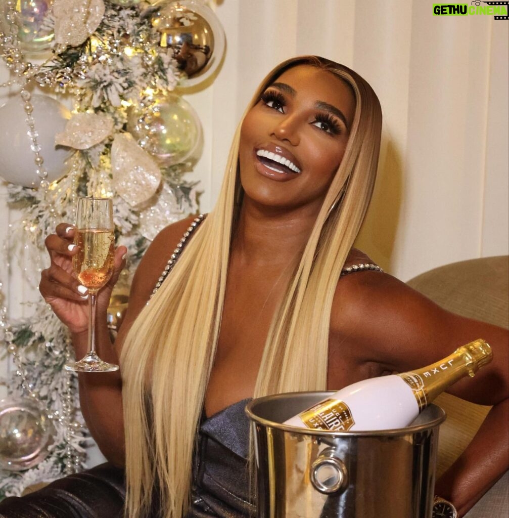 NeNe Leakes Instagram - The Holiday season is here! Get into the mood with a Bottle of @officialbelaire ‘Tis the season @richforever #champagne #ladiesofsuccess
