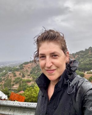 Mayim Bialik Instagram - As the rain washes away 2023, I can’t help but hope it’s making way for a brighter 2024. Wishing you a year filled with joy and new beginnings! 🌧️🌟🎉