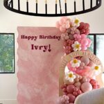 Daniella Monet Instagram - truth is, planning my kids birthdays overwhelms me sm, which is why I always leave it for last minute then somehow go overboard, lol. It’s a cycle.

Thank you to all my friends who helped me pull this special day together for our Ivry girl 💗

I’ll share all my special resources w you - save this reel.

custom birthday signs: @olivewood.creative 
balloons: @letspartywithmemsi
gf/df/ organic charcuterie: @getgrazedbyjamie 
floral: @garden_florist
gourmet sandwiches: @coraltreecafe 

more details in the comments! 

also, if you’re like me, and you’re a mama and get easily stimulated - I feel you. It’s one day, or two…. Or however many if you have multiple 👶 big or small, we do it for the mems! ✊🏼