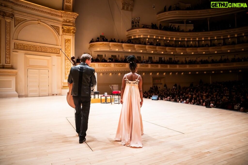 Amanda Gorman Instagram - A dream come true to perform at Carnegie Hall with @janvoglercello. Thank you to @dornmusic and all those who came to see us. It was an incredible opportunity of a lifetime, and one that I will continue to cherish long after the curtain call 💛

.
.
.

Amanda Gorman and Jan Vogler
An Evening of Poetry and Bach
Carnegie Hall
February 17, 2024
Presented by Dorn Music

Photos by Chris Lee @chrisleephotonyc

Styling: @jasonbolden and @prada
Makeup: @lyndaesparza
Hair: @aggie_hair