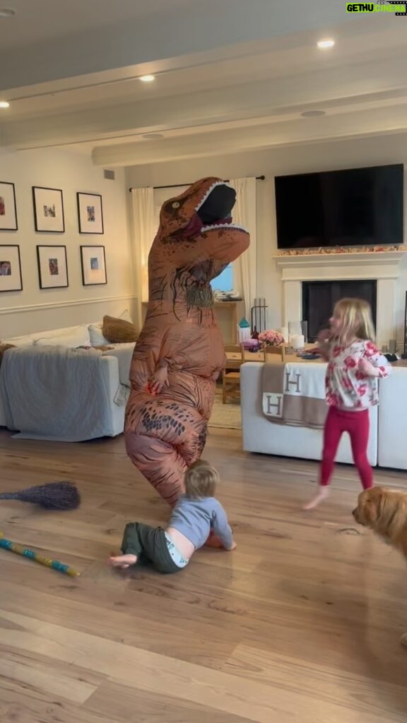 Camilla Luddington Instagram - Rainy day today with the kiddos. Just let this momasaur dance to @beyonce damnit!!! 🦖