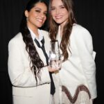 Sophia Bush Instagram - #SXSW kicked off right. I was so honored to present @lilly with @variety’s Comedy Crossover Award at their Power of Comedy event.

From her start on YouTube, to her meteoric rise across television, film, social media, writing, directing, and advocacy (don’t even get me started on her party planning skills), Lilly is a true multi-hyphenate. Her new film, “Doin’ It” premieres at SXSW on Tuesday. She co-wrote, executive produced, and stars in it, and I’m counting down the minutes until we all get to watch!
 
Lilly is an incredible comedian because she fearless in her storytelling. She doesn’t shy away from the truth. She always says, “yes, and.” And I think that’s why audiences just can’t help but fall in love with her. Also, she’s Canadian so that helps with likability. I say that as a 50% Canadian. This is math AND science.

I’m so excited for you, babe! And I’m so thrilled I finally got to wear this perfect Western fringe from my pals @tanner.fletcher. This IS Texas! Yeehaw 🤠