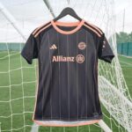 Lena Gercke Instagram - This one is sooo special! 🤩🧡🖤
 
Introducing the first ever bespoke female kit for @fcbfrauen designed by @legerbylenagercke. 🔗 Available on International Women’s Day – 8th of March!