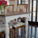 Ree Drummond Instagram - Ree’s bestselling dining table was just updated in a gorgeous soft white, and whether you pair it with your own favorite wood chairs or Ree’s floral ones, it’s definitely the table that dreams were made of! We are absolutely loving it. ❤️😊