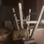 Vivienne Westwood Instagram - Our medium Hazel bag features this season's 'Sticky Croc' design, complete with an imaginary prehistoric reptile motif. The piece is finished with patent embossing, as a playful ode to 80's style.⁠
⁠
#VWSS24
