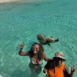 Tabitha Brown Instagram – Family I made it to see the swimming pigs!!!!!!! @teamchancebrown was like naawww i ain’t getting off the boat but you go head 😂😂😂. #ididanewthing #tabithabrown