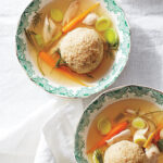 Martha Stewart Instagram - The homemade version of matzo ball soup can be sublime, and it’s perfect for kicking off a week of Passover traditions. Seltzer and baking powder keep the matzo balls nice and fluffy while schmaltz (chicken fat for the uninitiated) adds richness. Get the recipe at the link in our bio. 📷: @kate_mathis