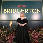 Nicola Coughlan Instagram - Surprise Oz! Lady Whistledownunder is in town 

So excited to kick off the Bridgerton World Tour in Australia! This moment has been literal years in the making I’m so excited we can finally start to share Season 3 with you all ❤️

A special thank you to THE Richard Quinn- I contacted him because I have been obsessed with this dress since I first saw it on the runway and dreamed of wearing it. I asked him if he and his brilliant team made it for me and they they did and it’s better than I ever could’ve imagined 🖤

Styled by @aimeecroysdill wearing custom @richardquinn & @malonesouliers 
Makeup @danielmartin 
Hair @gavinanesburybeauty 
@vrwpublicity 

#bridgerton #bridgertoninbowral