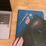 Fearne Cotton Instagram - A day in the life....(minus cleaning up a cat shit under the bunk bed, and other more mundane bits of my day)
1) prepping for todays podcast. Im old school. I use a notepad and a pen. For me its unbeatable. It gives me the opportunity to write, re write and learn the flow of conversation before the actual podcast recording. I also keep all my notepads which I plan to bore my children with one day. 
2) producer @anouszkatate at Happy Place Studios cool socks. After a bad nights sleep I needed that messaging. 
3) Normal...a bear slumped at a desk in the neighbouring studio. 
4) I might be mad but I've already started writing a second novel before my first, Scripted has been published. I felt I couldn't leave this new idea sat for too long. 
5) more notepads full of ideas for the new book, the @happyplaceofficial festival and more. At the moment I'm bursting with ideas....which is probably why my sleep has gone to shit again. 
Hows your day been?