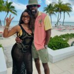Tabitha Brown Instagram - Happy ❤️. Still celebrating 26 years together and 21 years of marriage ❤️ #tabandchance 
Bathing suit @versace 
Coverup @target