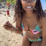 Tabitha Brown Instagram - Celebrating our Anniversary in the Bahamas and did some new things today!!!! We went to an iguana 🦎 island and fed them grapes!!! I even got @teamchancebrown to do it 😂. #tabithabrown #ididanewthing #iguanaisland #bahamas #chancebrown
P.S.  Abitha and Gunitha is out here!!!