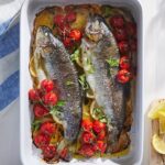 Martha Stewart Instagram - Cooking a fish whole, as opposed to fillets, is a quick and simple way to get dinner on the table. This recipe for baked trout is a whole meal since the cherry tomatoes and Yukon gold potatoes roast with the fish. Even better, everything bakes in the same dish, making this a one-pan meal. The fish's skin is crispy, the potatoes are tender, and the cherry tomatoes burst and caramelize. Get the recipe at the link in our bio. 📷: @rachelfromiowa
