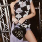 Vivienne Westwood Instagram - Find our Argyle jacquard across luxury garments this season, complete with a revisited checked motif. Style alongside our Heart Crossbody bag, featuring a bone motif, reminiscent of our Rock Chicken Bone T-shirt, from the archive 'Let It Rock' collection of 1971.⁠
⁠
Now available online and across our boutiques.⁠
⁠
#VWSS24