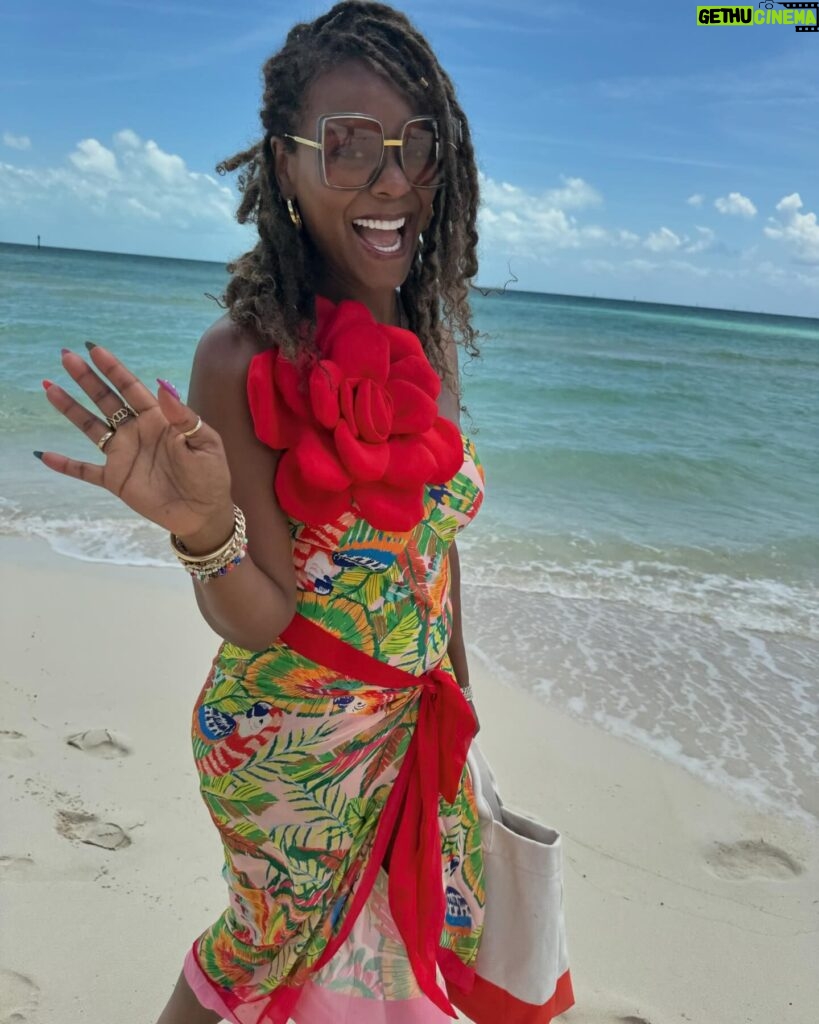 Tabitha Brown Instagram - It’s giving FLOWER POWER!! 🌺 Baby i ordered this bathing suit and cover up from one of those @tiktok shops and you really can’t tell me nothing out here in the Bahamas!!!! #swimwear #tiktok #tabithabrown #bahamas