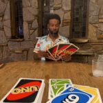 Tabitha Brown Instagram - When that vision ain’t what it used to be😂😂😂😂 We had to pull out the big @uno cards last night for @teamchancebrown 😂😂😂😂. 😂 #familytime #tabithabrown