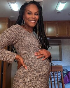 Tabitha Brown Instagram - New character loading…… I can’t wait to share this film with yall! Living my dreams and super grateful! 
🙌🏾OOHHH GOD I THANK YOU🙌🏾 
Yall know the shop is closed so this the only way yall gonna see me pregnant😂
#tabithabrown #actress #film #movies 
Hair @hairbyhim 
Makeup @_cincodemaya
