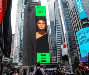 Aastha Gill Instagram - I'm delighted to tell you #kyun has reached NY #timessquare with @spotifyindia 💛

#Equal