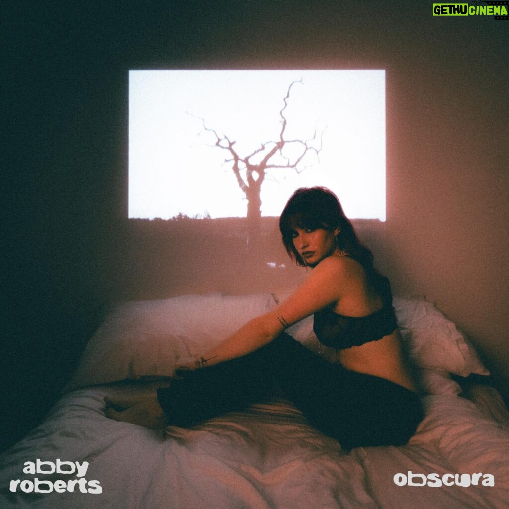 Abby Roberts Instagram - obscura 💫 my second ever ep will be urs soooon!!😭 i’m so so excited to finally announce that my new ep will be out in the world on the 24th of may 🥀 this collection of songs have been written accross the past 3/4 years and gives a little snapshot into my coming of age experience; life lessons, introspection, self sabotage & the mess that is discovering where u fit in this world. i hope these songs resonate with you guys & i can’t wait to scream them with u. they are my favourite songs i’ve made to date & i couldn’t be more proud!! thank u @sophbuckleyy for creating my favourite visuals ever with me and tirelessly obsessing over every last detail, i love u. PRESAVE IN MY BIO BABYYYYY🌟🌟🌟