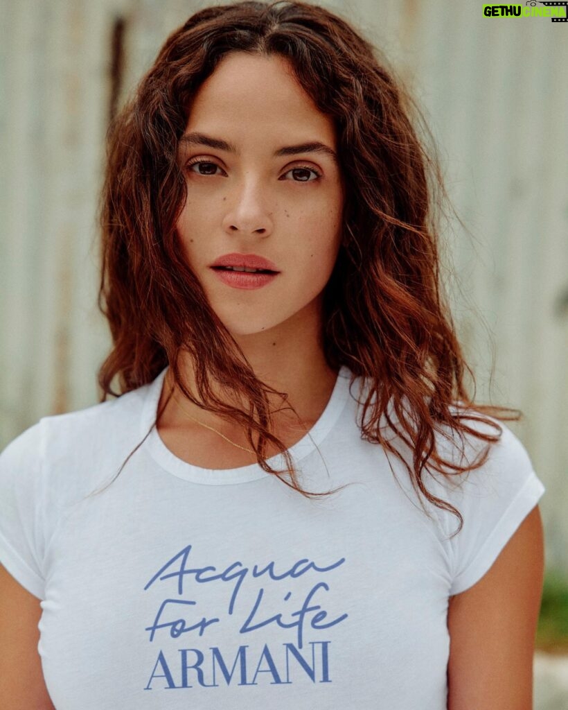 Adria Arjona Instagram - Today is World Water Day. Women and girls around the world spend a collective 200 million hours a day collecting water, a duty that deprives them to work or go to school. Because everything begins with water, Armani's ACQUA FOR LIFE initiative has been a source of clean water for 590,000 people, in 23 countries and aims to be a source for 1 million people by 2030. Be a source too, check Acqua for Life on armanibeauty.com @armanibeauty #acquaforlife