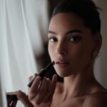 Adria Arjona Instagram - Lip power one of my personal favorites and the key in creating this look with my dear friend @babskymakeup @armanibeauty #Armanibeauty #ArmaniMakeup Luminous Silk Foundation in shade 7.5 Luminous Silk Concealer in shade 5 Luminous Silk Glow Fusion Powder in shade 4 Luminous Silk glow blush 60 Eye Tint in shades 8 and 10 Smooth Silk Eye Pencil in shade 12 Eyes to Kill Classico Mascara Lip Power in shade 102