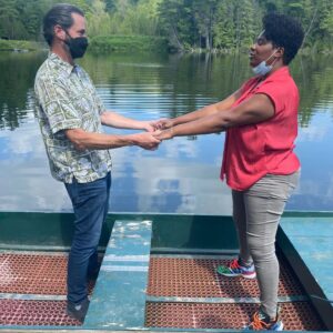 Adrienne C. Moore Instagram - #BTS It's finally here. Happy season 2 premiere @prettyhardcases . So excited the US gets to binge it on @imdbtv, soon to be freevee. I've attached BTS photos from season 2. I have more to share, but I'll start here.

1. S/O to my girl @fieldhousekdp our glorious DP (cinematographer) of 2 seasons. She runs 3 departments on set and does it so well. I would often sit in her chair cause she would let me play with her cool camera gadgets while she was setting up shots.
2. To know me on set, is to know I'm always fooling around. Here I try to use all my might to push a private plane. Think I moved it at all?
3. Love my cast. Here's @b.darenherbert and my other fearless leader friend @meredithmacneill.
4. This was a night shoot til about 5am. We were trying to get as much in before the sun came up. 
5. And this is a picture of the CN Tower on that night shoot that lasted til 5am.
6. Our award winning stunt director @southcampfilms. Yep, he's my friend. He's just an all around cool guy.
7. Me chasing somebody. You'll have to watch the episodes to see which episode this was. But facts, I'm always chasing somebody on this show.
8. Didn't know I had ups did you?
9. @jaydenmccrate my buddy and mic guy. He's like my little brother. He gets on my nerves but I love him.
10. And finally Ms @hairloks who braved hella high water and seas to come support me on this journey. Thanks Arlette. She got my back. Always!