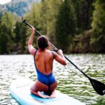Aja Naomi King Instagram - So let me tell you a little story. I woke up this morning and thought to myself, I want to try something new. I had never paddle boarded before and when you see other people do it in photos or videos it looks mad easy, so I thought that is what I shall try today. This story is already long so let me cut to the end… I CRIED!!! I paddled my behind out there on my knees and the second I stood up I burst into tears. I felt so scared. And I don’t understand why- I can swim, there are no sharks in this lake (🤣), it’s cold but I can handle cold. I don’t know why, but once I stood on the thing I couldn’t figure out the balance and I was frozen in fear and started crying and then I could only laugh at myself. Long story long, the second I could muster up the courage I worked my way back down to a sitting position and paddled back to shore, to safety in my irrational mind. I did not try again, but I know I will one day. I was utterly shocked by how afraid I was, and then I was kind of thrilled that I did something that truly took me by surprise. So I’m proud of myself for trying something new even if it didn’t go the way I thought it would. What are you all trying these days?