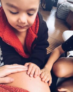 Alexa PenaVega Instagram - Nothing quite like the miracle of a baby growing in a mothers womb ♥️ “For you created my inmost being; you knit me together in my mother’s womb”. Feeling this little baby play and and kick… and then watching Ocean, Kingston and Rio discover their little sibling is such an emotional experience. Feeling the kicks with me. Watching the little flips my belly does. The joy we all get from this little life we don’t yet know… That’s how I know it’s nothing short of a miracle.