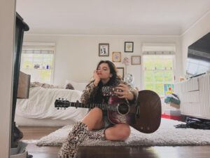 Alexis Jayde Burnett Instagram - this guitar knows everything