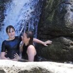 Alicia Silverstone Instagram – While white water rafting, Bear and I enjoined this nice refreshing moment. It was hard to keep balance on rocks and under the waterfall 😂🥰