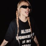 Alison Wonderland Instagram - DROPPING THIS FRIDAY 2PM PST: The “Father collection” featuring THE BEST SUNGLASSES EVER @sito.shades , ALISON WONDERLAND IS MY DADDY TEE, ALISON WONDERLAND IS MY DADDY FLAG. 😎I WILL BE GIVING AWAY 3 FLAGS AND 3 PAIRS OF GLASSES all you need to do is tag someone in the comments and like the post!!!! Will announce winners 10am PST Friday 😎 avail On www.fmuoasl.com