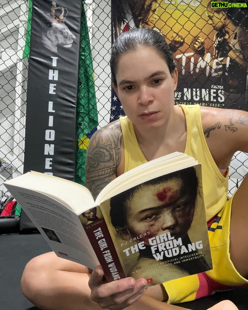 Amanda Nunes Instagram - During each workout break, I dive into the pages of the book @thegirlfromwudang 🤩🥋 It’s like being in the octagon 🔥 @pjcaldas is a Brazilian best-selling author, and that’s his first novel in English! Get yours too 👊🏼 . A cada pausa do treino, mergulho nas páginas do livro @thegirlfromwudang 🤩🥋 É como estar no octógono 🔥 @pjcaldas é um autor best-seller brasileiro, e este é o seu primeiro livro em inglês! Garanta o seu também 👊🏼