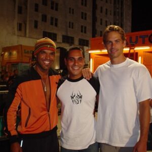 Amaury Nolasco Instagram - October/2002 #TBT 
To my 1st studio movie 
2Fast 2Furious.
Paul welcomed me with open arms the very 1st day. And said “Welcome to the show” 
I will never forget how comfortable he made me feel.
Thanks to the late John Singleton for giving me my first shot.
Later I brought my best friend @ricky.navarro to set and we took this photo. 
RIP
@paulwalker 
@johnsingleton
