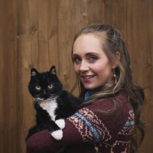 Amber Marshall Instagram - I recently passed the 1 Million followers mark on Instagram and it got me thinking about the content I’ve posted over the past 11 years… 
I have never been big on “selfies,” or photos of what I’m up to, but I do love sharing my farm, and the animal friends that adopt this space with us. 

The very first post I made on this account back in December 2012 was of our cat “Turner Valley” curled up on my bed. 📸 I had Shawn take this photo of me with her today to give an honourable mention to this sweet old kitty. 
“Turner Valley” was a stray I brought home in June of 2010. Heartland was filming in the town of Turner Valley and there was a litter of kittens born in an old storage shed in town. After confirming with the owners of the property that the cats were in fact strays… I set out on a mission that day to give one a good home. *For anyone out there who’s tried to catch eight-week-old untouched, stray kittens, it can be quite the challenge!! They are feisty little things and put up a good fight. After obtaining some thick leather gloves from our costume department I set out with a towel and was able to grab this little black and white hissing ball of fluff. I named her after the town she was born in, and took her home to begin gaining her trust. 
Turner has never been a cuddly cat, and prefers the company of dogs to humans or other cats, but for 14 years she has had a warm bed to sleep in and a full tummy. Her best friend was our old shepherd, Remi (yes from Heartland) who we brought home the same summer. They bonded instantly and Turner would always be the first to run to Remi and greet her, rubbing all over her and purring loudly. As soon as Remi found a good place to take a nap, Turner was there cuddled beside her. (Story too long for this post and continued in comments)

Thanks for reading this #MarshallSundayStory! Any requests for next weeks Animal Story? 😊

To see more photos and posts of Miss Turner Valley scroll through or click here: #AmbersCatTurner