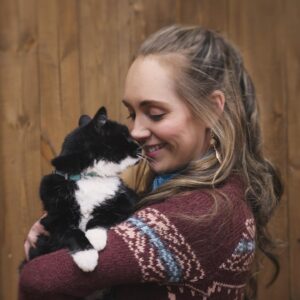 Amber Marshall Instagram - I recently passed the 1 Million followers mark on Instagram and it got me thinking about the content I’ve posted over the past 11 years… 
I have never been big on “selfies,” or photos of what I’m up to, but I do love sharing my farm, and the animal friends that adopt this space with us. 

The very first post I made on this account back in December 2012 was of our cat “Turner Valley” curled up on my bed. 📸 I had Shawn take this photo of me with her today to give an honourable mention to this sweet old kitty. 
“Turner Valley” was a stray I brought home in June of 2010. Heartland was filming in the town of Turner Valley and there was a litter of kittens born in an old storage shed in town. After confirming with the owners of the property that the cats were in fact strays… I set out on a mission that day to give one a good home. *For anyone out there who’s tried to catch eight-week-old untouched, stray kittens, it can be quite the challenge!! They are feisty little things and put up a good fight. After obtaining some thick leather gloves from our costume department I set out with a towel and was able to grab this little black and white hissing ball of fluff. I named her after the town she was born in, and took her home to begin gaining her trust. 
Turner has never been a cuddly cat, and prefers the company of dogs to humans or other cats, but for 14 years she has had a warm bed to sleep in and a full tummy. Her best friend was our old shepherd, Remi (yes from Heartland) who we brought home the same summer. They bonded instantly and Turner would always be the first to run to Remi and greet her, rubbing all over her and purring loudly. As soon as Remi found a good place to take a nap, Turner was there cuddled beside her. (Story too long for this post and continued in comments)

Thanks for reading this #MarshallSundayStory! Any requests for next weeks Animal Story? 😊

To see more photos and posts of Miss Turner Valley scroll through or click here: #AmbersCatTurner