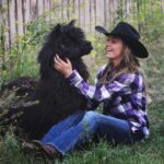 Amber Marshall Instagram - #MarshallSundayStory: Last week I told you the story of how my cat Turner came to live with me. This week, (after many requests) we will learn more about #BettyTheAlpaca who lived with us for a decade before she crossed the rainbow bridge. It was the summer of 2013 and I was at a ranch with my friend @KatieConnolley looking at some horses that were for sale. There was a lone alpaca there, so asked what her story was. The owner said he didn’t know how old she was, or much about her, as she had been left behind from a previous herd. He then said, “If you want her she’s yours.” I had no experience with llamas or alpacas but something about her just made me want to bring her home. She was not tame, and we had to wrangle her into a small pen, then rope and tackle her. I put an old t-shirt over her face to keep her calm, then we lifted her into the backseat of my truck - we hadn’t brought a trailer, so I sat holding her while my friend Katie drove us home (see last photo that was taken when we arrived home). I decided to turn her out with my cows so she wasn’t alone, and instantly she loped over to the young calves and started grooming them. She became Nanny Betty from then on. She took her job so seriously she would never let the calves out of her sight. My moma cows began trusting Betty, and would leave their calves with her for hours while they went out further to graze. Over the years Betty really warmed up to me. She even learned how to be haltered and walk nicely while being led. I miss Betty, as do my cows, and I’m not sure I will ever find another alpaca like her. ❤️ 🦙 Story too long for this post, I have continued in the comments. See more of Betty on Instagram here: #BettyTheAlpaca