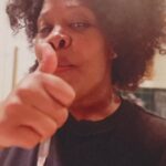 Amber Riley Instagram - Cooking in my boyfriend’s tshirt again 🥰 Smothered chicken in gravy w/ mushroom over rice 🫶🏾 cooking is so therapeutic for me and I really wanted comfort food. I’ll be out of the country for work for a month, so this week I’ll be cooking all the foods I’ll miss 😂 It was my first time making gravy from scratch! Let me know if you all want this recipe for the Mushroom and Gravy 🥰🙌🏾 (If you talk about my hair you’re antiblack 🤣😂)