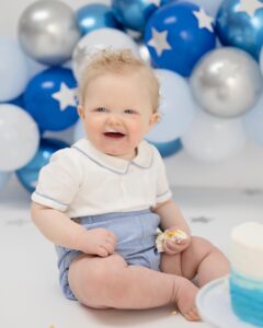Amy Hart Instagram - Stanley’s having a smashing time 😢🍰 we took our gorgeous little man to @kate_priest_photography for his cake smash and I’m obsessed with the photos 🤩🤩🤩 There are more but they’re landscape so there will be another post 🤣 Did you do a cake smash for your little one? 💕 #cakesmash #firstbirthday #firstborn #firstbirthdaycake #cakesmashbrighton #baby #son #babyphotos #babyphotoshoot