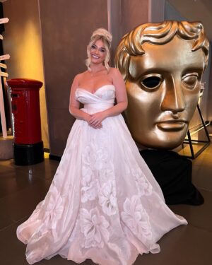 Amy Hart Instagram - Living my Barbie princess dreams 🌷🌸🌺PSA: I don’t need to know if you don’t like it, I loved it and felt amazing 😍 

Dress: @theweddingclubofficial 
Styled by : @jeffmehmet1 
Hair: @iamjamesjohnson 
Make Up: @marcosgmakeup 
Content Queen: @ultrasophisticate 
Jewellery: @sifjakobsjewellery 
Invited by : @pandocruises 🥰

#baftas #barbie #inesdisanto