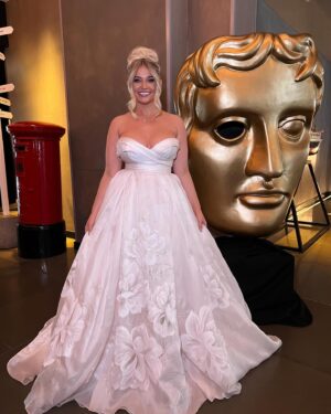 Amy Hart Instagram - Living my Barbie princess dreams 🌷🌸🌺PSA: I don’t need to know if you don’t like it, I loved it and felt amazing 😍 

Dress: @theweddingclubofficial 
Styled by : @jeffmehmet1 
Hair: @iamjamesjohnson 
Make Up: @marcosgmakeup 
Content Queen: @ultrasophisticate 
Jewellery: @sifjakobsjewellery 
Invited by : @pandocruises 🥰

#baftas #barbie #inesdisanto