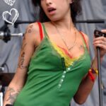 Amy Winehouse Instagram - Amy’s journey across the Glastonbury stages spanned three impactful performances. In 2007, she headlined on the Pyramid Stage, echoing the success of her acclaimed album, ‘Back To Black’. 💞