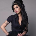 Amy Winehouse Instagram - Glamorous Amy captured in her iconic beehive & cat-eye look by photographer Jason Bell at the Elle Style Awards in 2007. 🖤