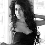 Amy Winehouse Instagram - In 2006, photographer Harry Benson captured Amy during her global success and recognition at the Savoy Hotel in London. The photographs beautifully highlight her lively and vibrant personality. 💗 #backtoblack